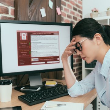 Unhappy women at computer